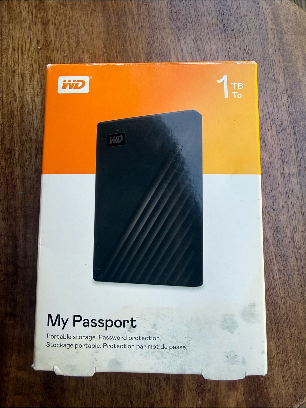 WD.NY My Passport Portable External Hard Drive in Black and Orange